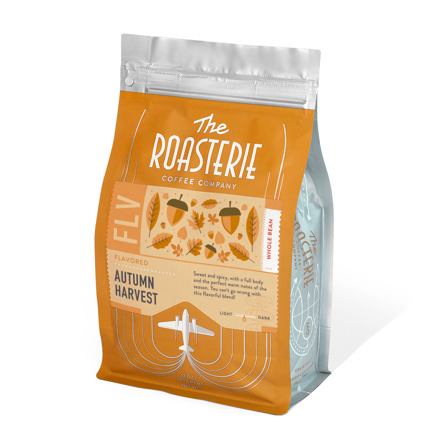 Autumn Harvest coffee bag from The Roasterie featuring orange packaging with acorn and leaf designs, resealable silver top, and airplane logo. Limited edition seasonal blend with warm fall flavors and full-bodied taste.