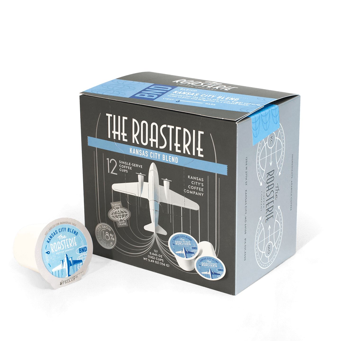Kansas City Blend Single Serve coffee pods box featuring vintage-style airplane design in black and light blue colors, with 12 individual pods. Box displays The Roasterie branding and artistic illustration of a classic aircraft against industrial elements.