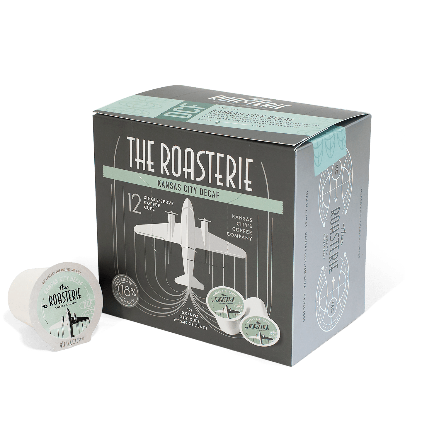 Kansas City Blend Decaf Single Serve coffee pods in a gray and mint green box featuring art deco-inspired design with airplane motif. Box contains 12 compatible single-serve pods from The Roasterie, with one pod displayed in foreground.