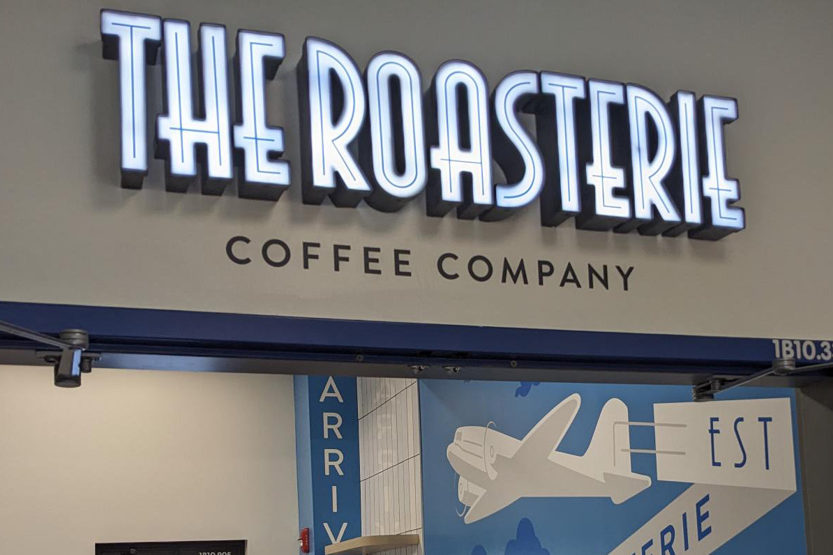 The Roasterie Coffee Company signage out front of the store.