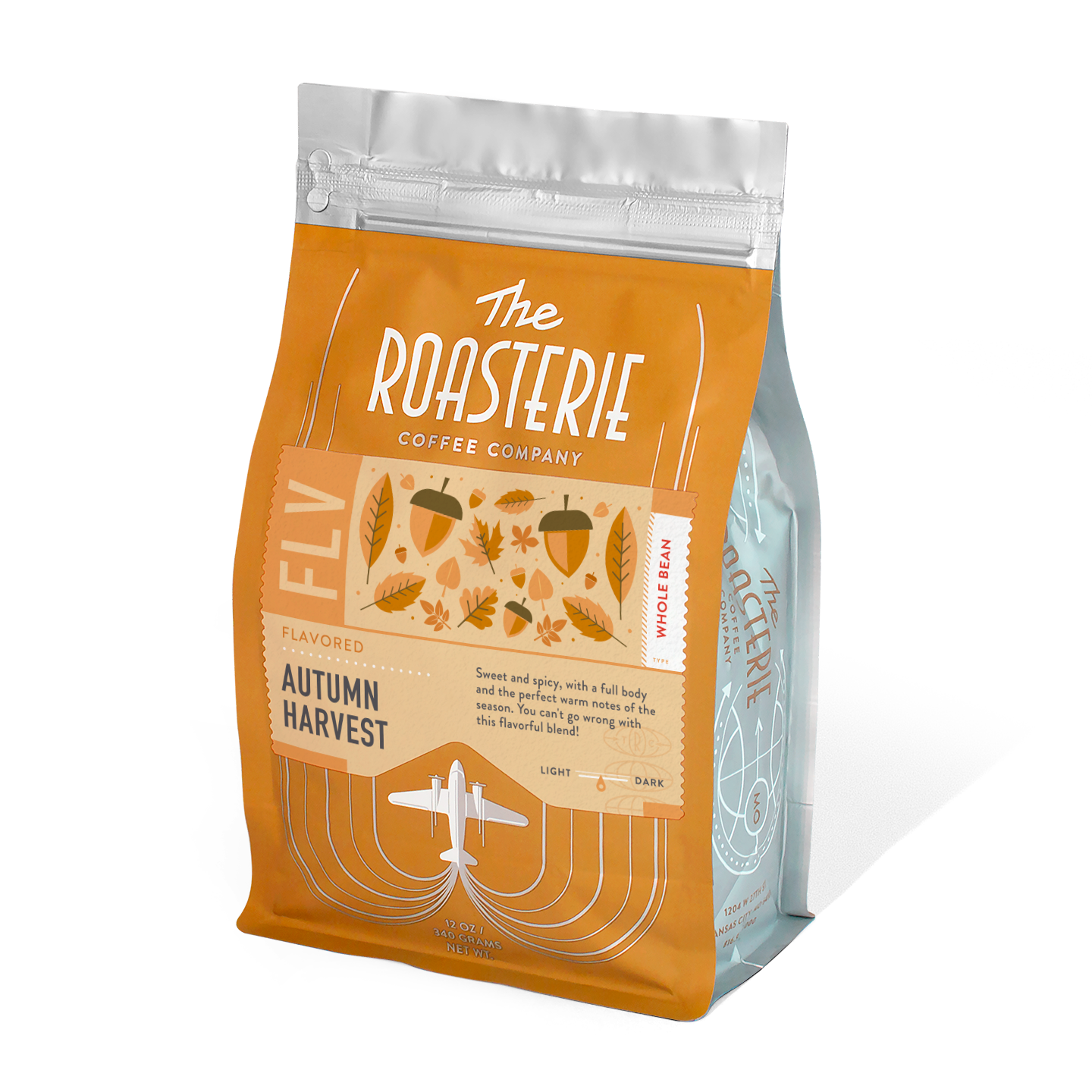 Autumn Harvest coffee bag from The Roasterie featuring orange packaging with acorn and leaf designs, resealable silver top, and airplane logo. Limited edition seasonal blend with warm fall flavors and full-bodied taste.